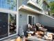 Charming patio with comfortable seating and a water feature next to sliding glass door at 5006 S Nelson St # B, Littleton, CO 80127