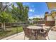 Outdoor patio with wicker furniture set, perfect for relaxing and entertaining in the backyard at 2692 S Osceola St, Denver, CO 80219