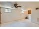 Large basement space with windows, offering potential for customization and expansion, or a recreation area at 2692 S Osceola St, Denver, CO 80219
