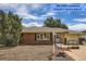 Charming single-story brick home with manicured landscaping and inviting entryway, lender credits available at 2692 S Osceola St, Denver, CO 80219