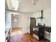 Modern kitchen featuring stainless steel appliances and plenty of room, perfect for cooking and entertaining at 2692 S Osceola St, Denver, CO 80219