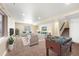 Cozy basement with neutral tones, plush carpeting, and a foosball table for recreation and relaxation at 1694 Jennifer St, Brighton, CO 80601