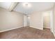 Spacious bedroom featuring neutral paint, carpet, and ample space for personalization at 1694 Jennifer St, Brighton, CO 80601