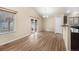 Open dining area with sliding glass doors and ample natural light at 1694 Jennifer St, Brighton, CO 80601