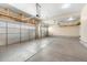 A spacious two car garage with overhead storage and extra room for parking at 1694 Jennifer St, Brighton, CO 80601