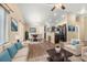 Comfortable living room with stylish decor and plenty of seating at 1694 Jennifer St, Brighton, CO 80601