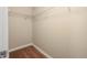 Functional walk-in closet with ample shelving for efficient organization of clothing and accessories at 1694 Jennifer St, Brighton, CO 80601
