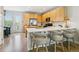 Kitchen with counter seating, stainless appliances, and white countertop at 4181 W 118Th Pl, Westminster, CO 80031
