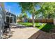 Backyard patio area with space for a grill and a swing set in the well-maintained yard at 19523 E Buchanan Pl, Aurora, CO 80011