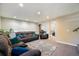 Basement with comfortable lounge area and adjacent access to other spaces at 19523 E Buchanan Pl, Aurora, CO 80011