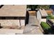Aerial view of stone facade house with long driveway and a storage shed at 8644 S Brentwood St, Littleton, CO 80128