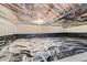 Unfinished basement with a vapor barrier at 8644 S Brentwood St, Littleton, CO 80128