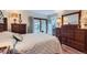 Bedroom with wood floors, with a view of the outside at 8644 S Brentwood St, Littleton, CO 80128