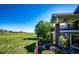 A spacious second-story porch with a great view of the surrounding, well-manicured, green spaces at 22685 E Calhoun Pl, Aurora, CO 80016