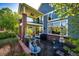 Backyard patio with outdoor seating, barbecue grill, and lush landscaping at 22685 E Calhoun Pl, Aurora, CO 80016