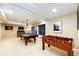 Large basement featuring a pool table, foosball table, and ample room for recreation at 22685 E Calhoun Pl, Aurora, CO 80016