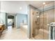 This primary bathroom includes a glass shower, soaking tub, and serene decor at 22685 E Calhoun Pl, Aurora, CO 80016