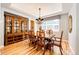 Elegant dining room with hardwood floors, classic furniture, and decorative lighting, ideal for entertaining at 22685 E Calhoun Pl, Aurora, CO 80016