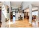 Grand foyer with hardwood floors, staircase, and open layout, showcasing elegant design and natural light at 22685 E Calhoun Pl, Aurora, CO 80016