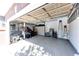 Organized three-car garage with ample storage space and epoxy flooring at 22685 E Calhoun Pl, Aurora, CO 80016