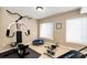 Home gym with multi-station equipment, providing a convenient workout space at 22685 E Calhoun Pl, Aurora, CO 80016