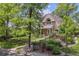 Charming two-story home with landscaped yard and mature trees in a desirable neighborhood at 1459 S Elizabeth St, Denver, CO 80210