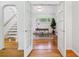 Bright office space showcasing hardwood floors, natural light, and elegant glass doors at 1459 S Elizabeth St, Denver, CO 80210