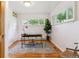 Inviting office area featuring hardwood floors, a modern desk, and ample natural light at 1459 S Elizabeth St, Denver, CO 80210