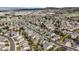 Aerial view highlighting the neighborhood layout, landscaping, and streetscapes at 3865 Rawhide Cir, Castle Rock, CO 80104