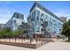 Contemporary condo building featuring a geometric design with glass facade, modern architecture, and stylish urban living at 55 W 12Th Ave # 510, Denver, CO 80204