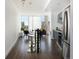 Bright, open kitchen featuring stainless steel appliances, counter seating, and a view of the city skyline at 55 W 12Th Ave # 510, Denver, CO 80204