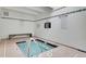 Indoor hot tub with tile flooring and spa rules posted on the wall at 7865 E Mississippi Ave # 602, Denver, CO 80247