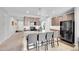 Well-appointed kitchen with stainless steel appliances, granite countertops, and a functional breakfast bar at 9635 Bellaire Ln, Thornton, CO 80229