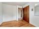 Empty bedroom with wood floors and a closet at 7425 S Dexter St, Centennial, CO 80122