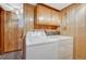 Practical laundry area equipped with a washer and dryer for convenient chores at 7425 S Dexter St, Centennial, CO 80122