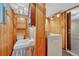 Utility room featuring a classic sink and faucet, a nearby toilet and washer dryer at 7425 S Dexter St, Centennial, CO 80122
