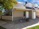 Charming condo exterior showcasing a well-maintained facade, visible unit numbers, and manicured surroundings at 12476 W Nevada Pl # 106, Lakewood, CO 80228