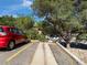 Assigned parking features a designated space with visible space numbers in a well-maintained lot at 12476 W Nevada Pl # 106, Lakewood, CO 80228