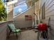 Private patio area with grill and seating, perfect for outdoor relaxation at 12476 W Nevada Pl # 106, Lakewood, CO 80228