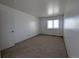 Bedroom with carpeted floor and bright natural light at 8791 Chase Dr # 220, Arvada, CO 80003
