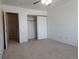 This cozy bedroom has a ceiling fan and a closet at 8791 Chase Dr # 220, Arvada, CO 80003
