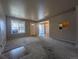Spacious living room with carpet, natural light, and an open view into the dining area at 8791 Chase Dr # 220, Arvada, CO 80003