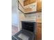 White oven and microwave combo, perfect for cooking delicious meals in your new home at 8791 Chase Dr # 220, Arvada, CO 80003