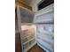 Interior view of a clean, white refrigerator with adjustable shelves and door storage at 8791 Chase Dr # 220, Arvada, CO 80003