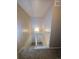Bright stairway landing with carpeted stairs and light walls at 8791 Chase Dr # 220, Arvada, CO 80003