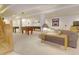 Spacious basement with a billiard table, foosball table, and relaxing seating area at 18399 Wagon Trl, Mead, CO 80542
