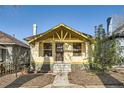 Charming home with a brick foundation and a well-maintained front yard at 2421 Hooker St, Denver, CO 80211