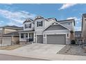 Beautifully designed two-story home with a spacious driveway and well-kept landscaping at 4792 Coltin Trl, Castle Rock, CO 80104
