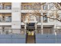View of the main entrance for the Parkside on Cherry Creek Condominium at 1000 E 1St Ave # 407, Denver, CO 80218