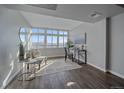 Bright sun room offers abundant natural light, cozy seating, and scenic views at 800 N Washington St # 706, Denver, CO 80203